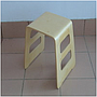 Curved wooden stool