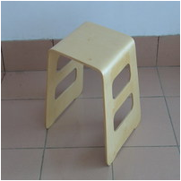 Curved wooden stool